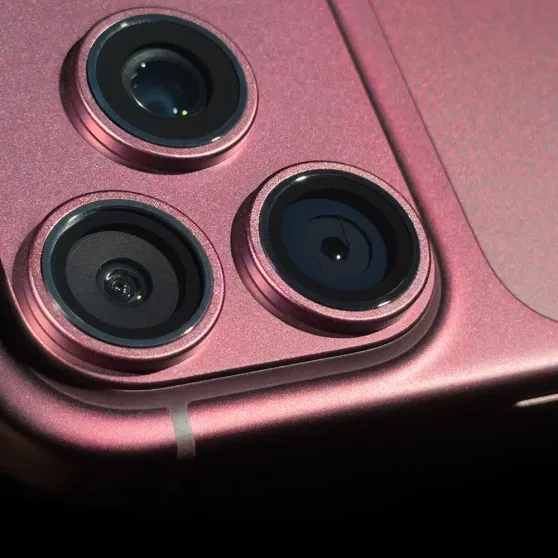 Close-up of an iPhone's rear camera lenses and variable aperture