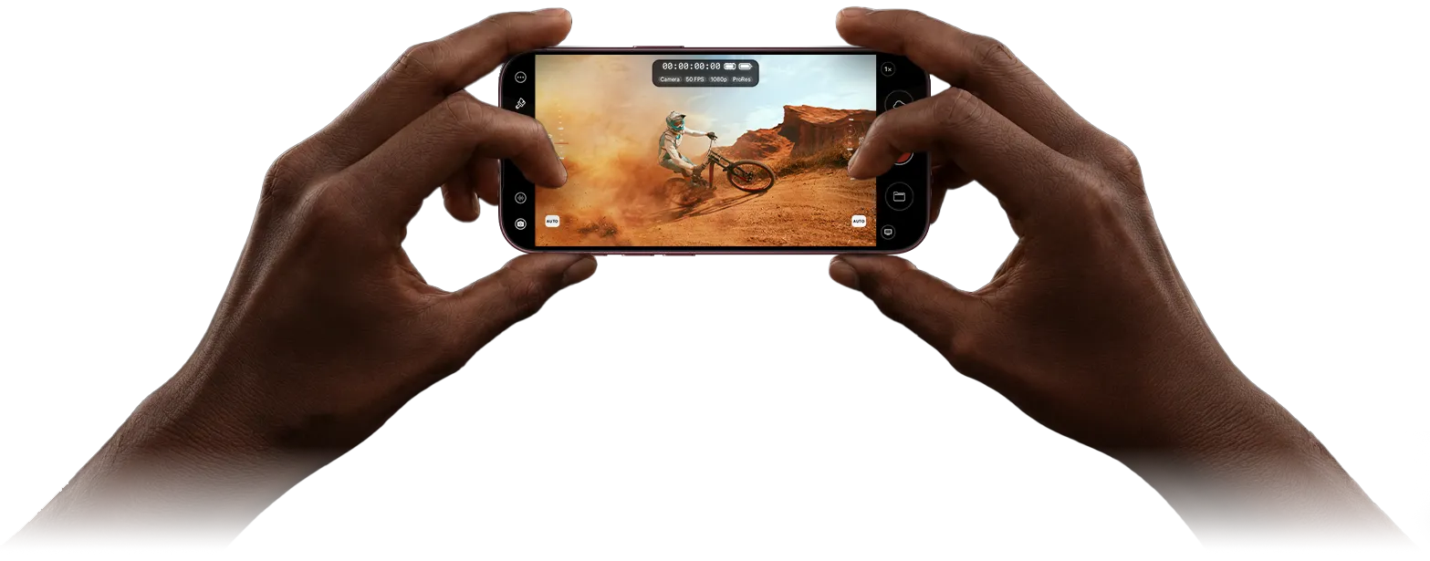 Hands filming a live performance with Mavis Camera on iPhone