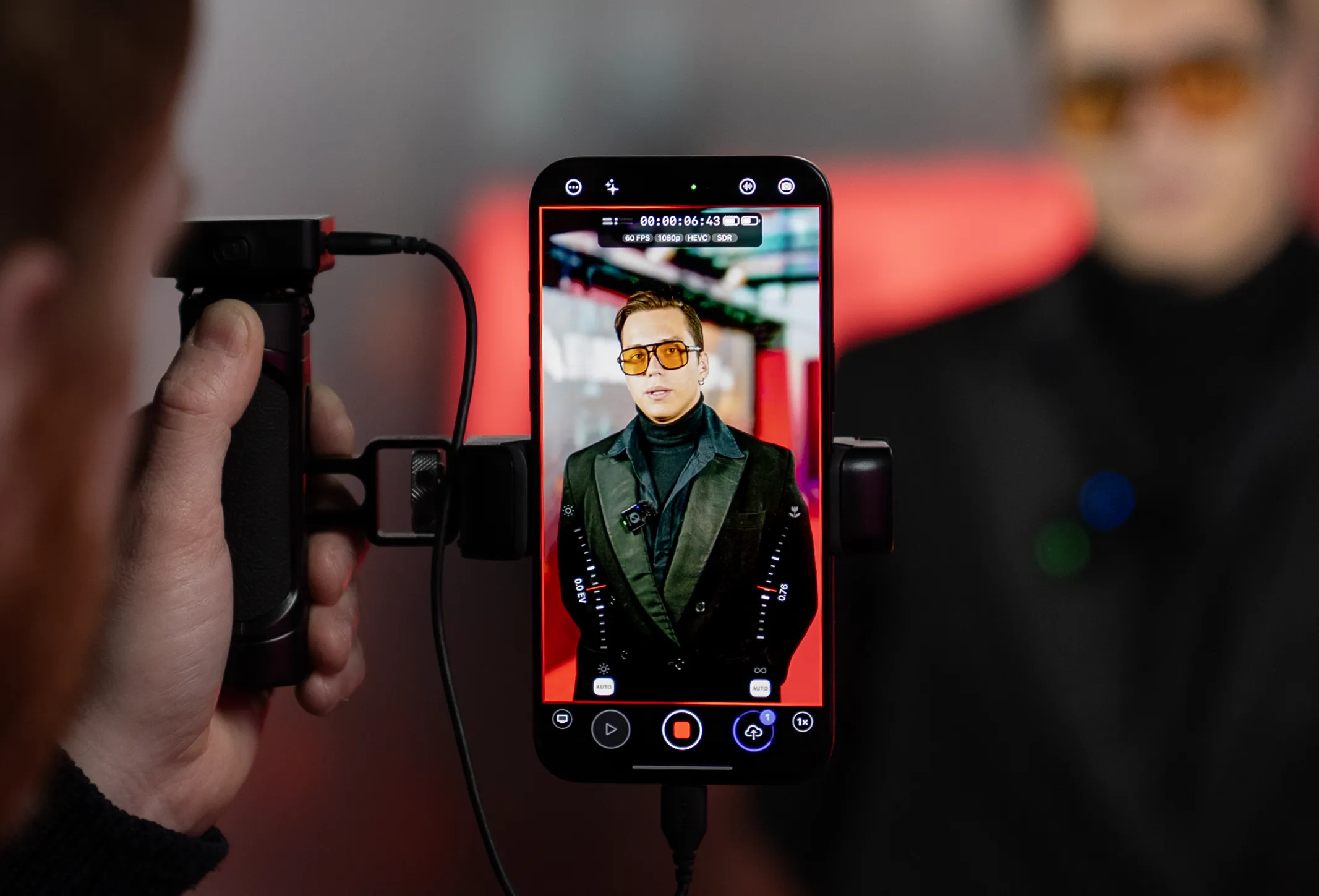 Mavis Camera records a red-carpet interview in portrait orientation