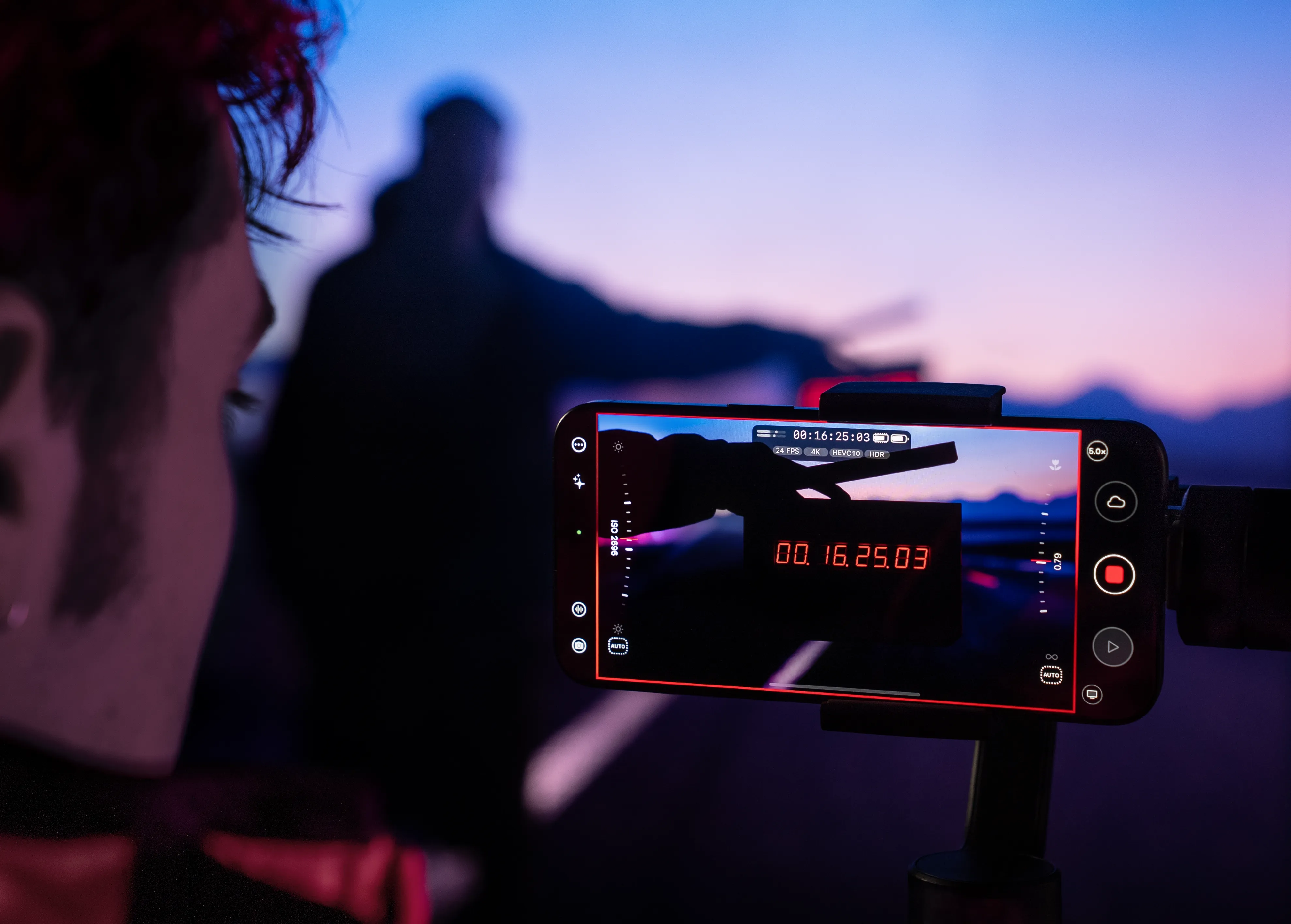 Mavis Camera films a timecode display at dusk